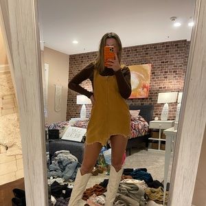 Courduroy overall dress with distressed hem